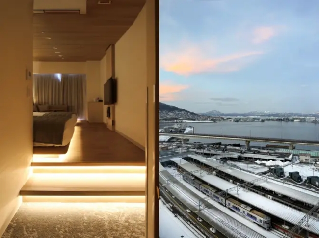 最上階の窓から見える函館湾と函館駅